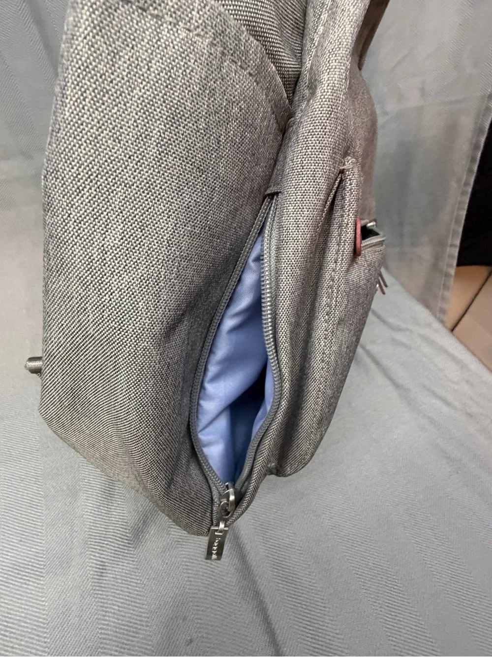 Baggallini all day backpack with handle multi pocket gray exterior blue interior